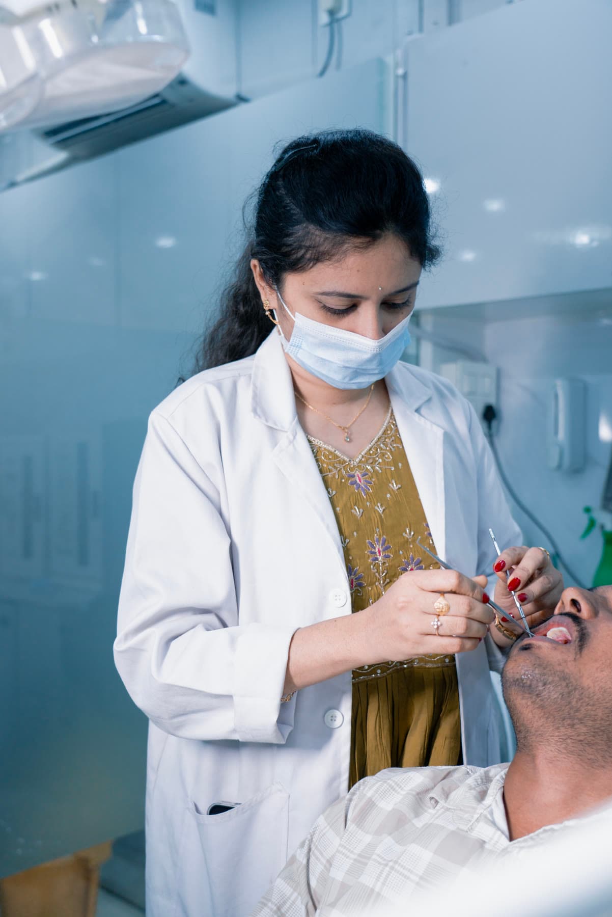 Doctor examining a patient chairside